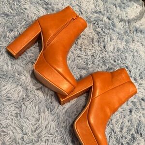 Chic Orange Heeled Boots